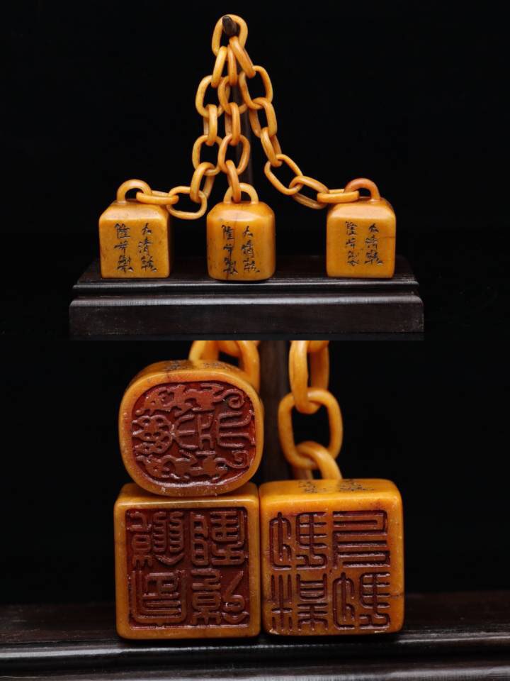 大清乾隆年制，田黄石雕刻故宫三链印章，萝卜纹清晰，红血丝布满，
规格:方：5×3.3×3.3cm ×